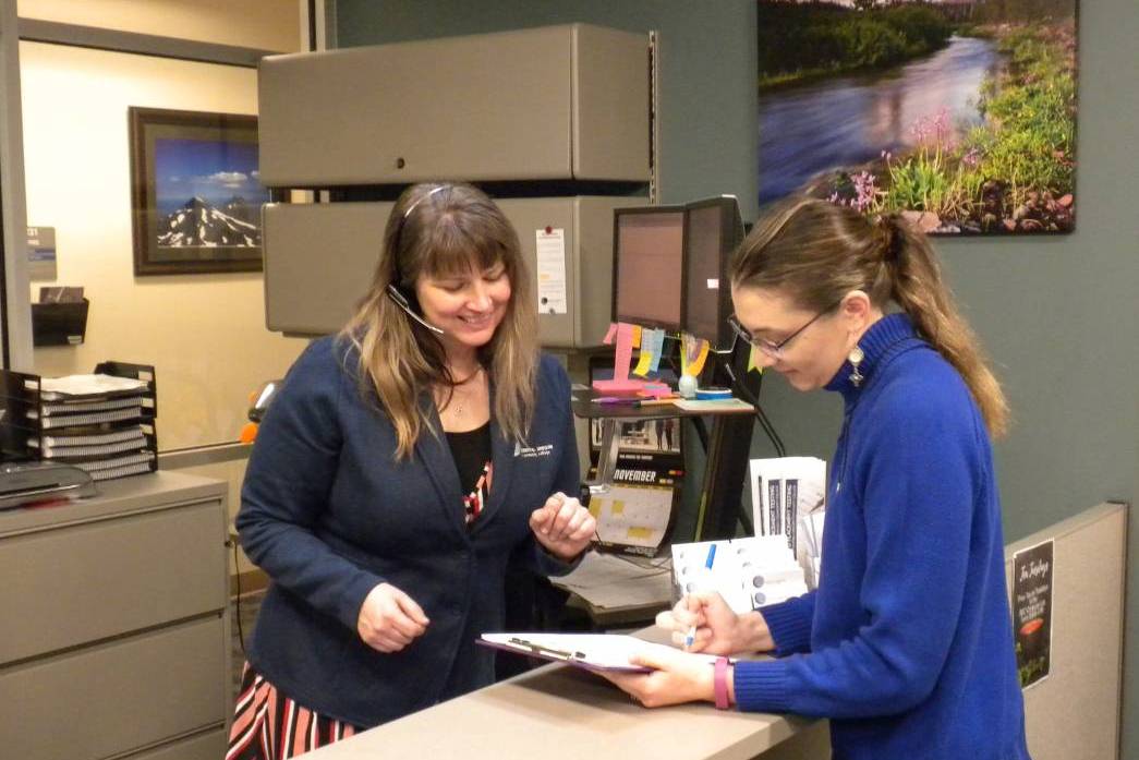 Instructional Support Services CAP services staff helping student