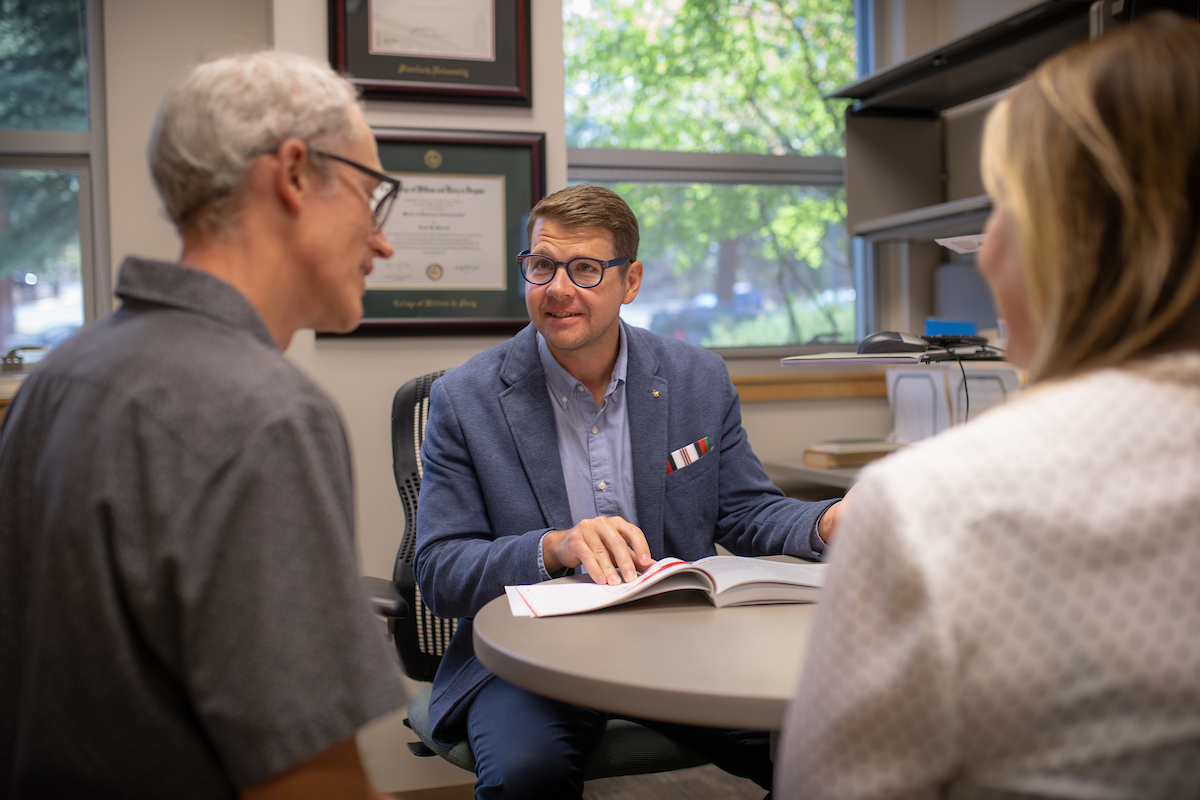 Small business adviser at COCC advising a student about small business management